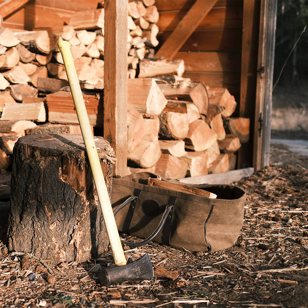 Wood is hide with firewood and ax 